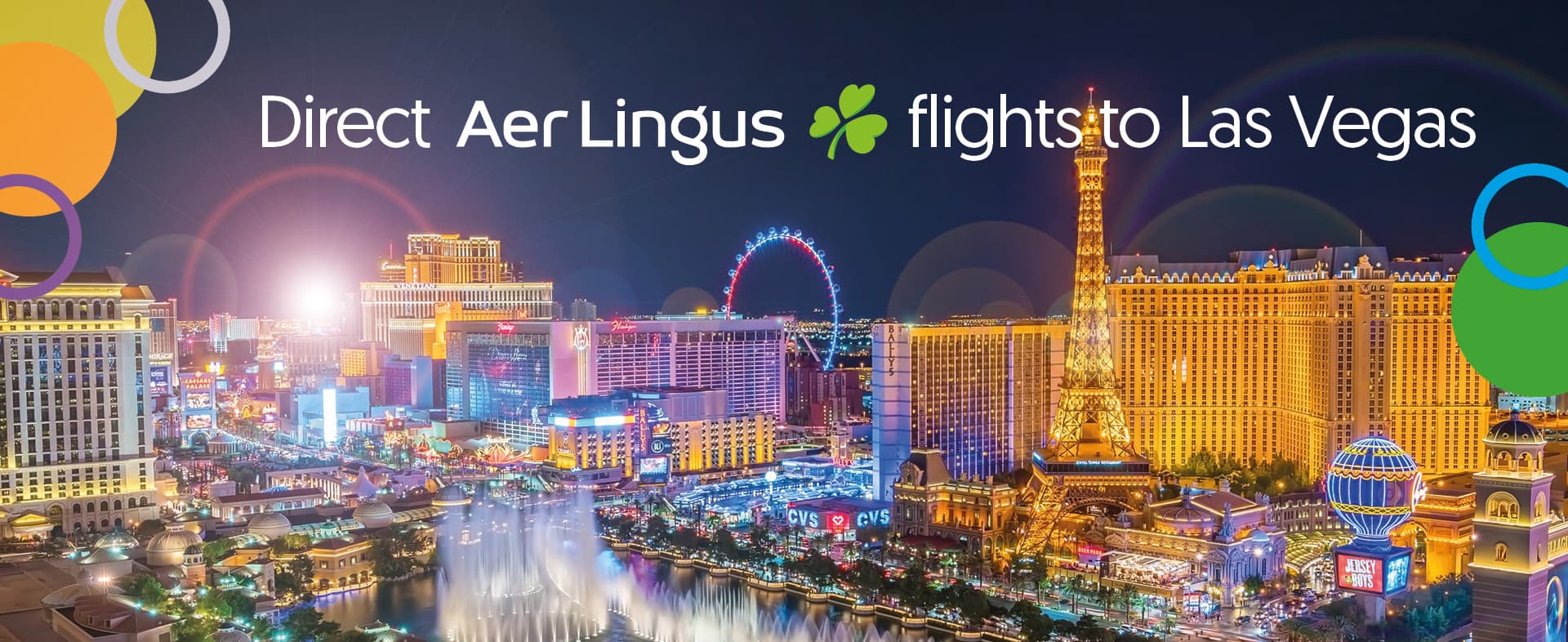 Bright nighttime view of the Las Vegas Strip with iconic hotels, casinos, and lights, promoting Aer Lingus direct flights to Las Vegas.