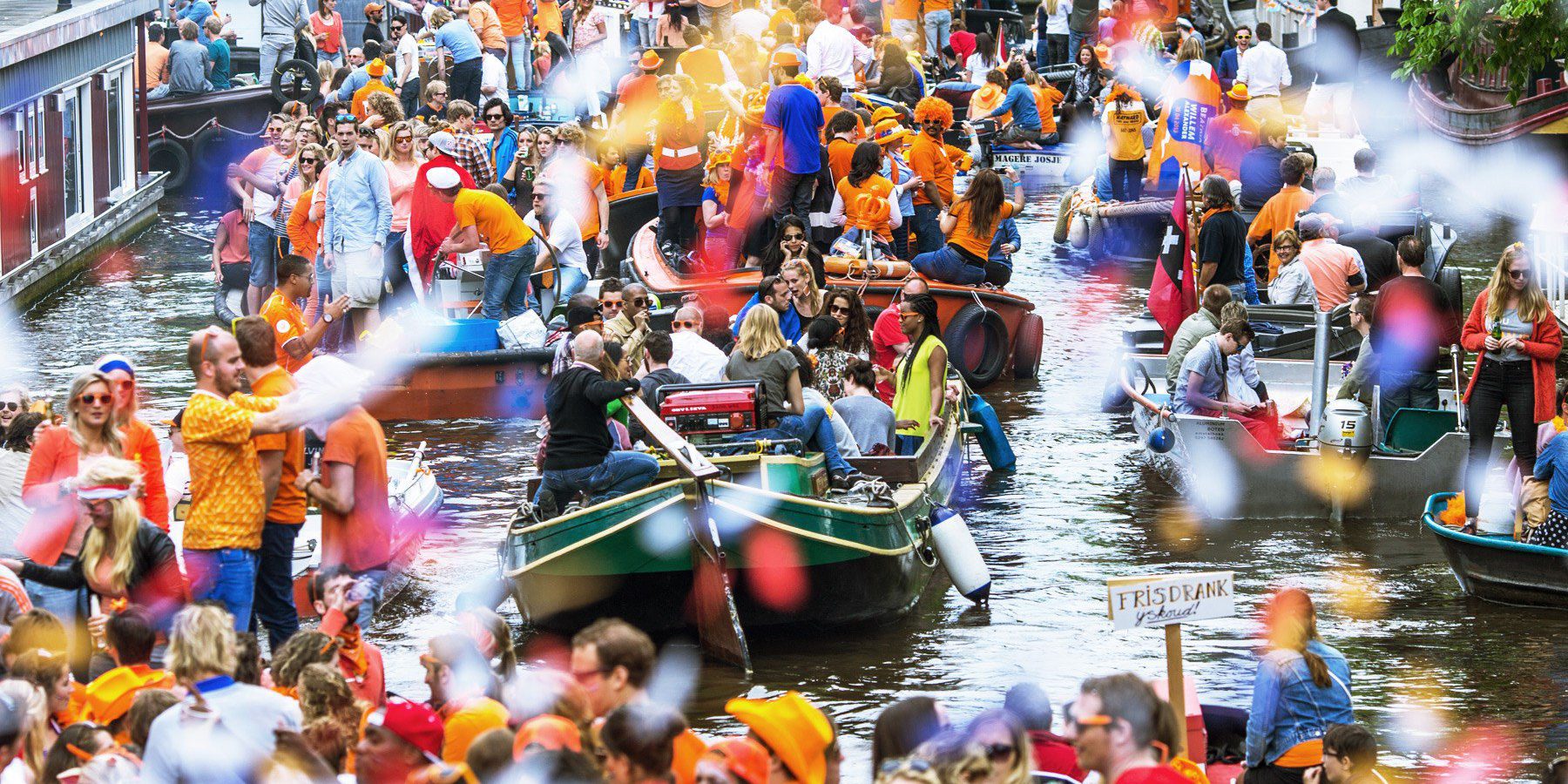 Parties on the canal for Kings Day in Amsterdam