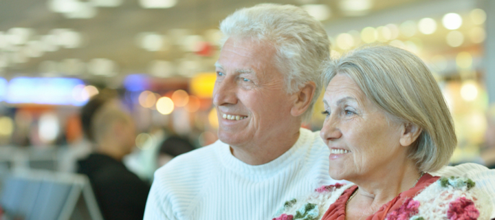 Older couple in airport | Over 50s Holidays Flights and Transfers