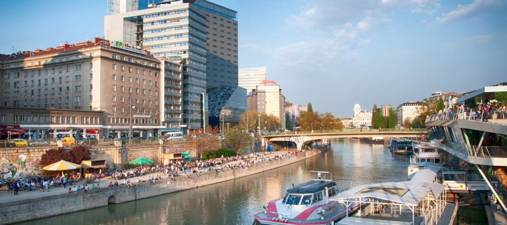 People socialising along the Danube in Vienna