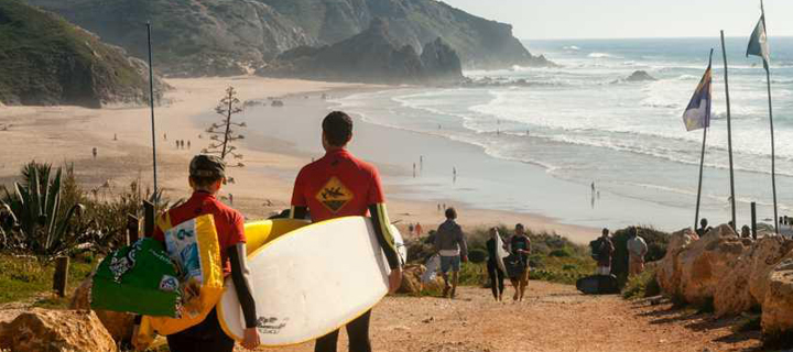 Surfers heading to the beach in the Algarve