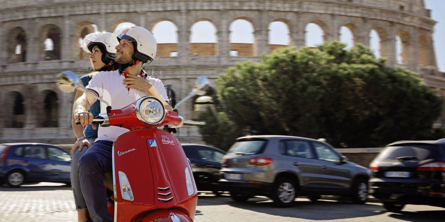 Couple on Vespa in Rome