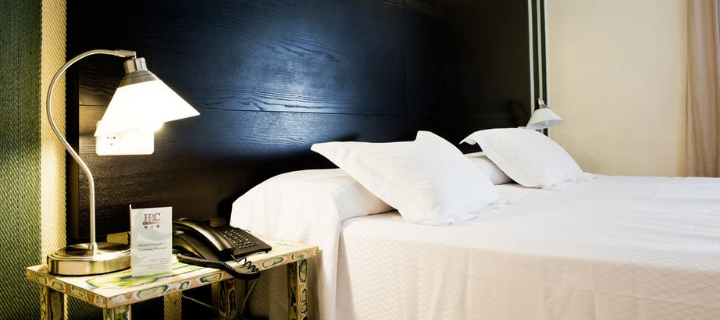 Bedroom in the 3* HRC Hotel in Madrid