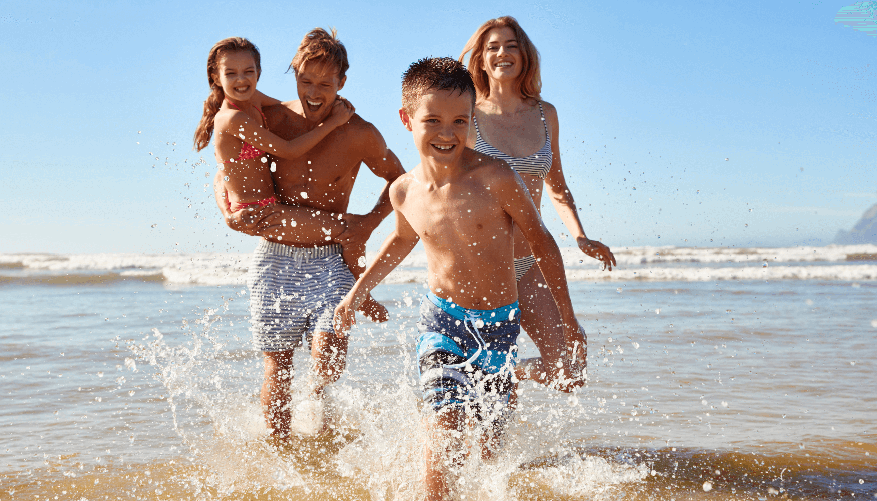 family at beach on holiday