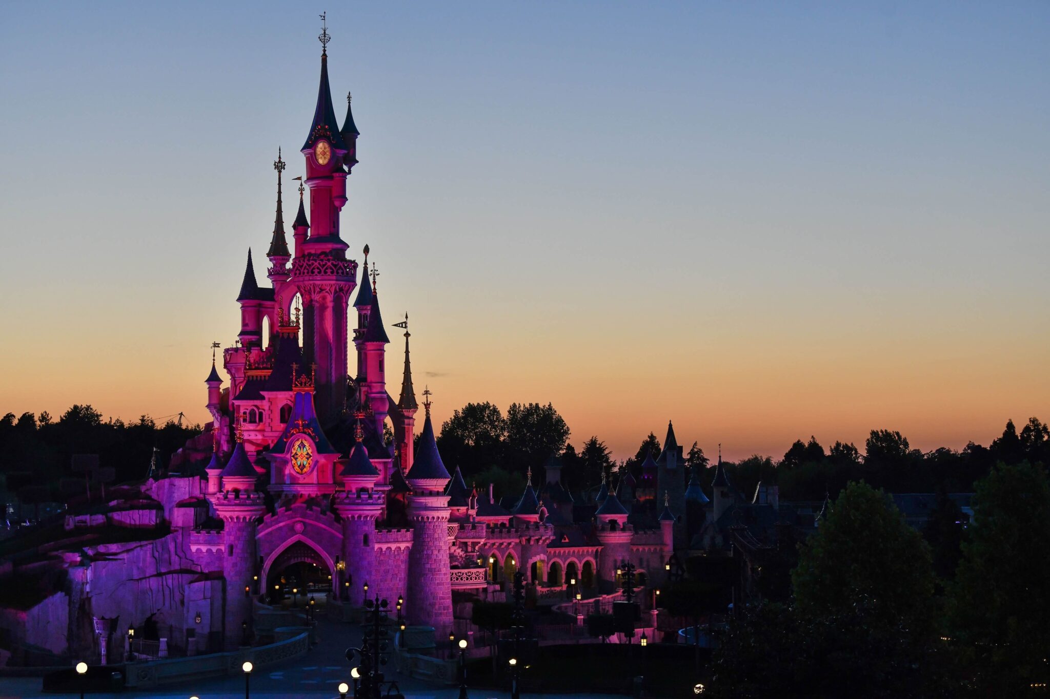 disneyland paris castle at sunset