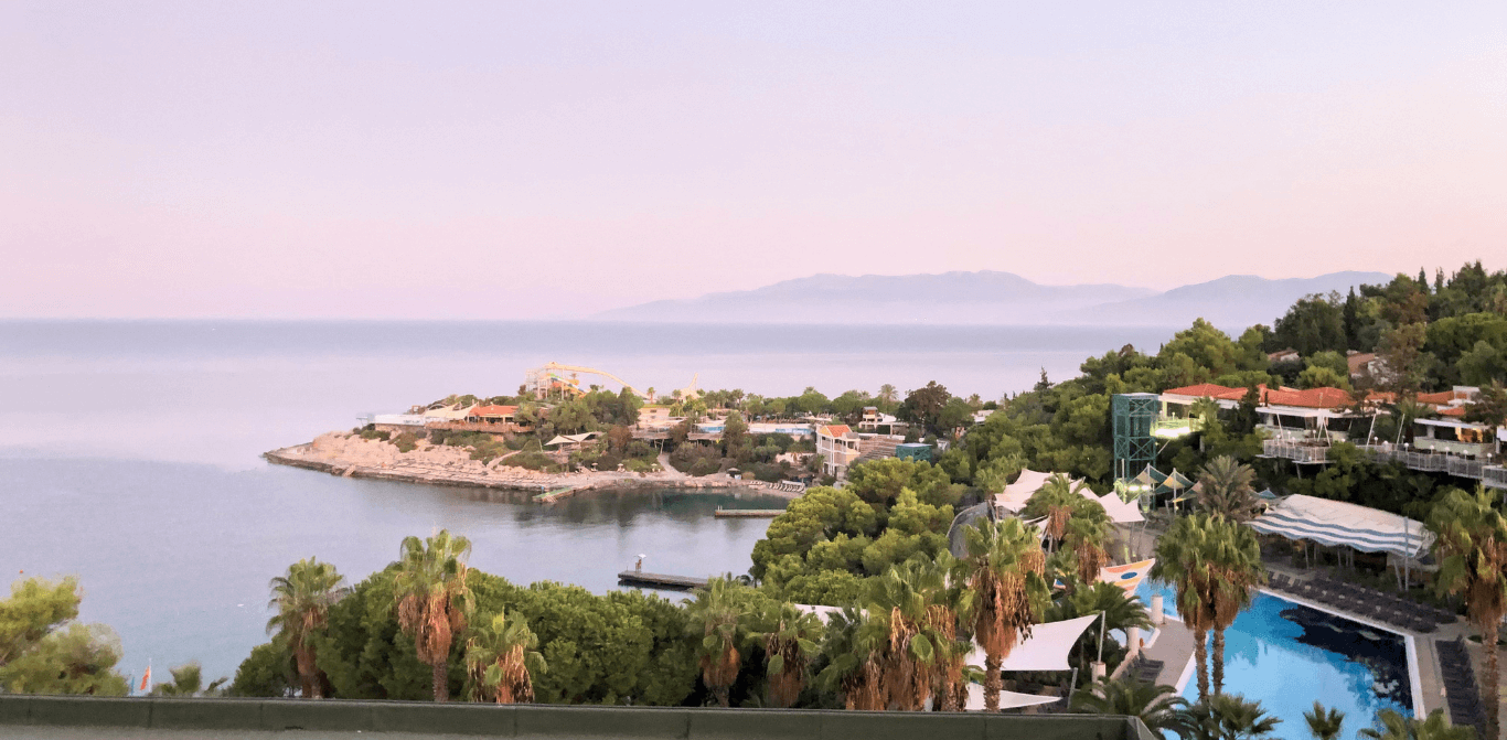 View of the Pine Bay Holiday Resort's pool and waterslides in Kusadasi