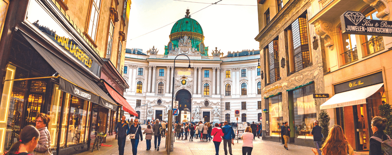 Kohlmarkt shopping street with a view of St. Peter's church in Vienna, Austria.
