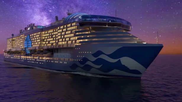 Exterior side view of a luxury LNG-powered cruise ship named Star Princess at sunset, showing illuminated windows and a blue wave design along the hull.