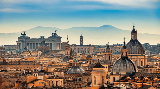 Panoramic skyline of Rome with historic domes and monuments including the Vittoriano