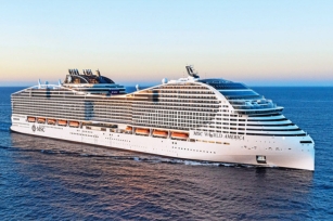 image of MSC World America as the sun shines against the ship cruising through the calm Waters